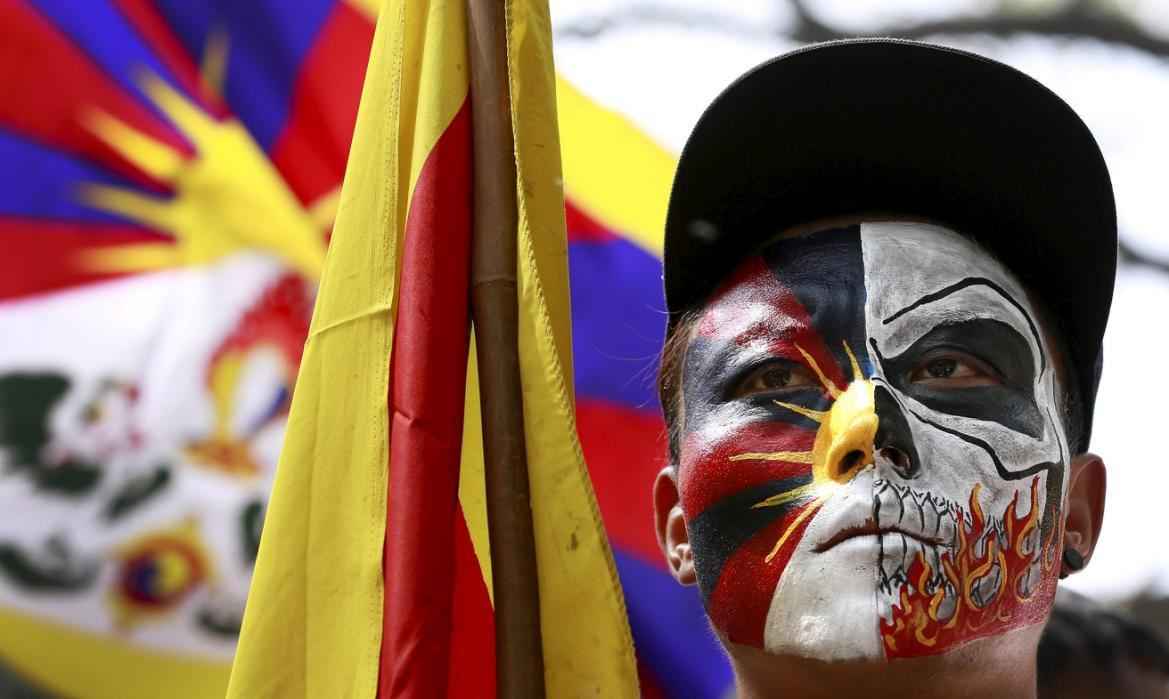 A Tibetan activist attends a protest held to mark the 57th anniversary of the Tibetan uprising against Chinese rule,  in New Delhi, India, March 10, 2016.  REUTERS/Cathal McNaughton      TPX IMAGES OF THE DAY