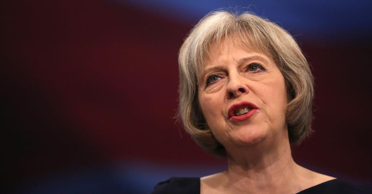 MANCHESTER, ENGLAND - OCTOBER 06:  Home Secretary Theresa May delivers her keynote speech to delegates during the Conservative Party Conference on October 6, 2015 in Manchester, England. Home Secretary Theresa May addressed delegates on day three of the Conservative Party conference at Manchester Central  and warned that it is "impossible to build a cohesive society" and the UK needs to have an immigration limit.  (Photo by Christopher Furlong/Getty Images)